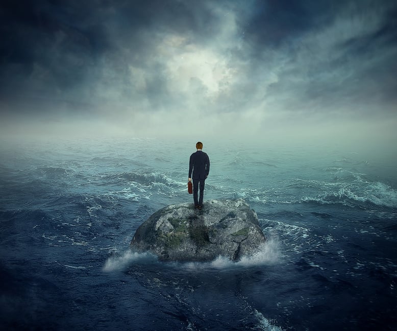 Failure crisis concept and lost business career education opportunity. Lonely young man on a rock cliff island surrounded by an ocean storm waves .jpeg
